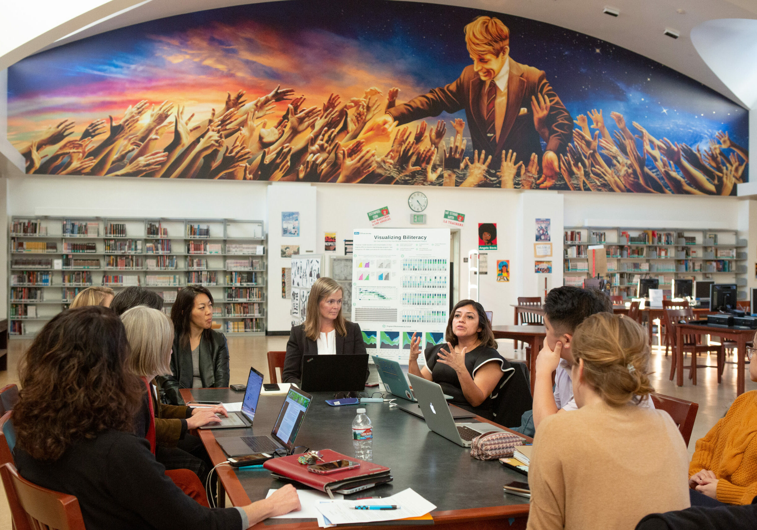 Teachers and staff from UCLA Community School meet with UCLA professors to discuss the various research projects happening at the school.